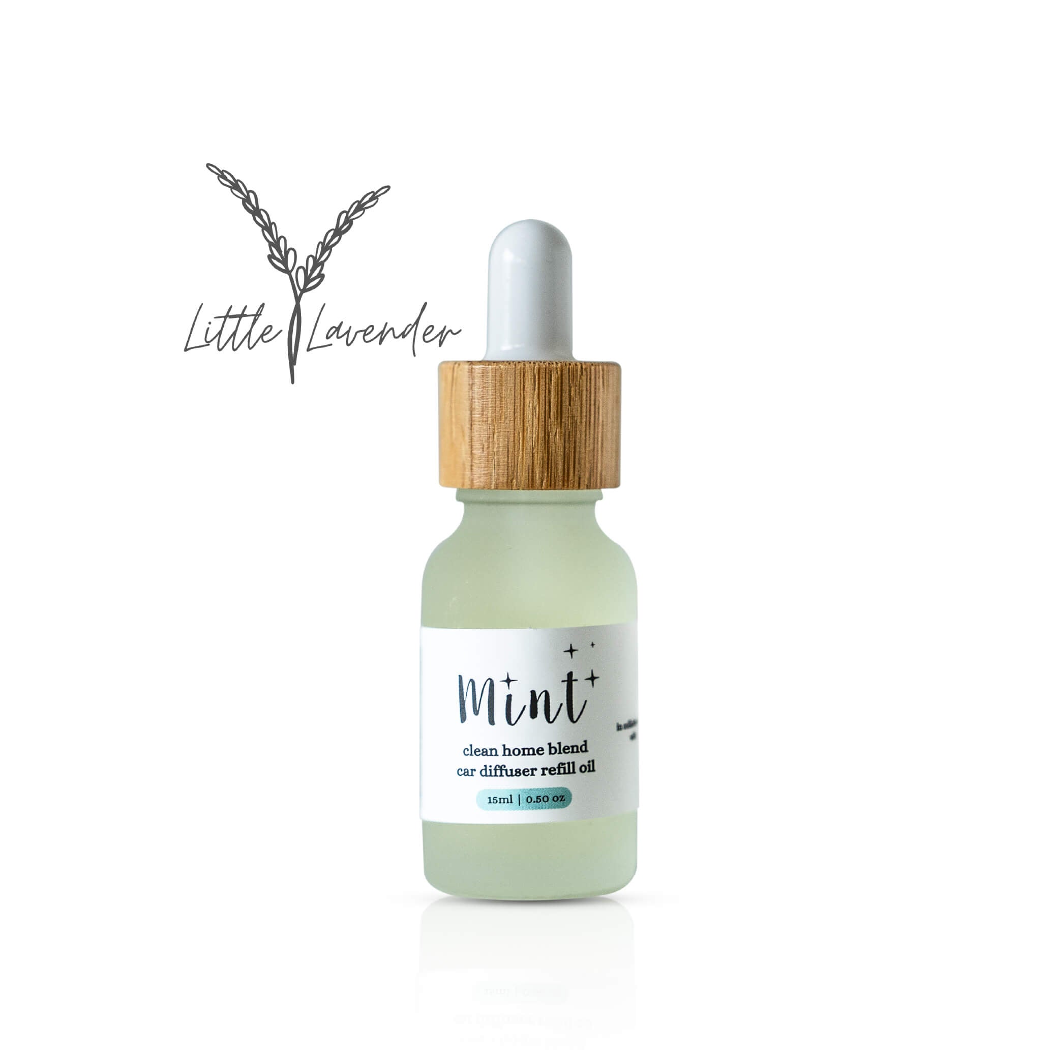 Bottle of Mint essential oil with wooden cap on a white background, featuring &