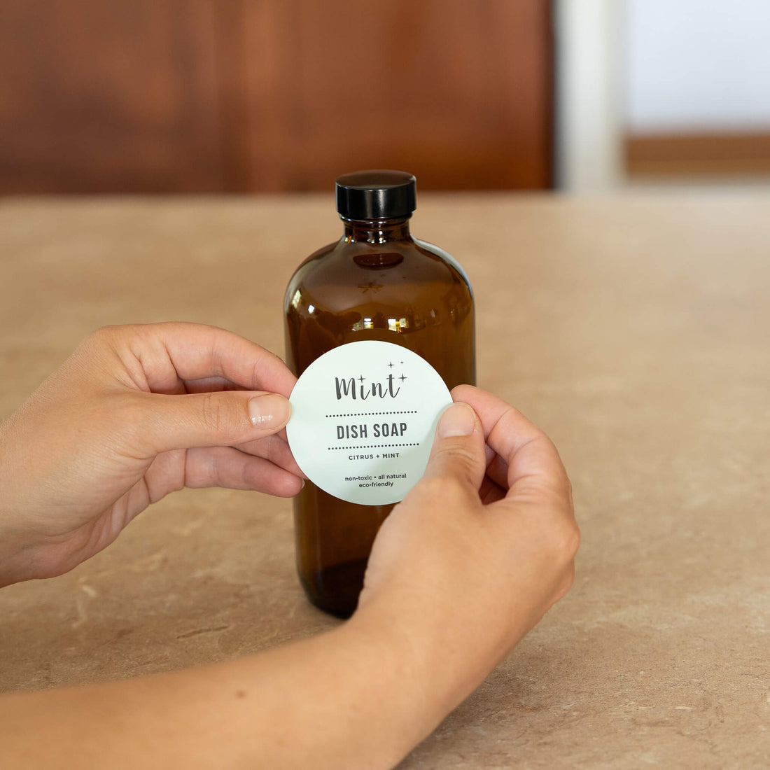 mint dish soap label on amber glass bottle