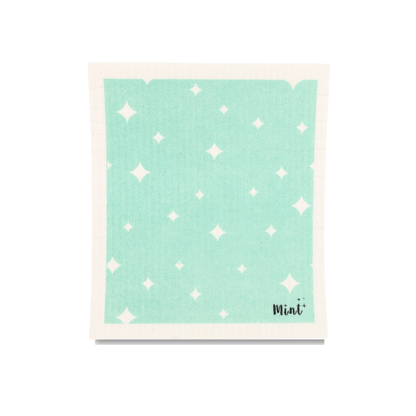 Mint x Goldilocks Swedish Dishcloth with mint green star design, laid flat on a white background.