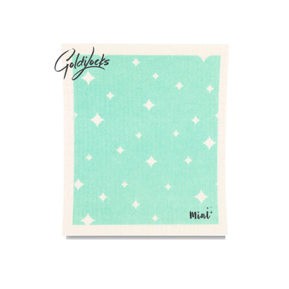 Mint x Goldilocks Swedish Dishcloth with mint green star design, laid flat on a white background.
