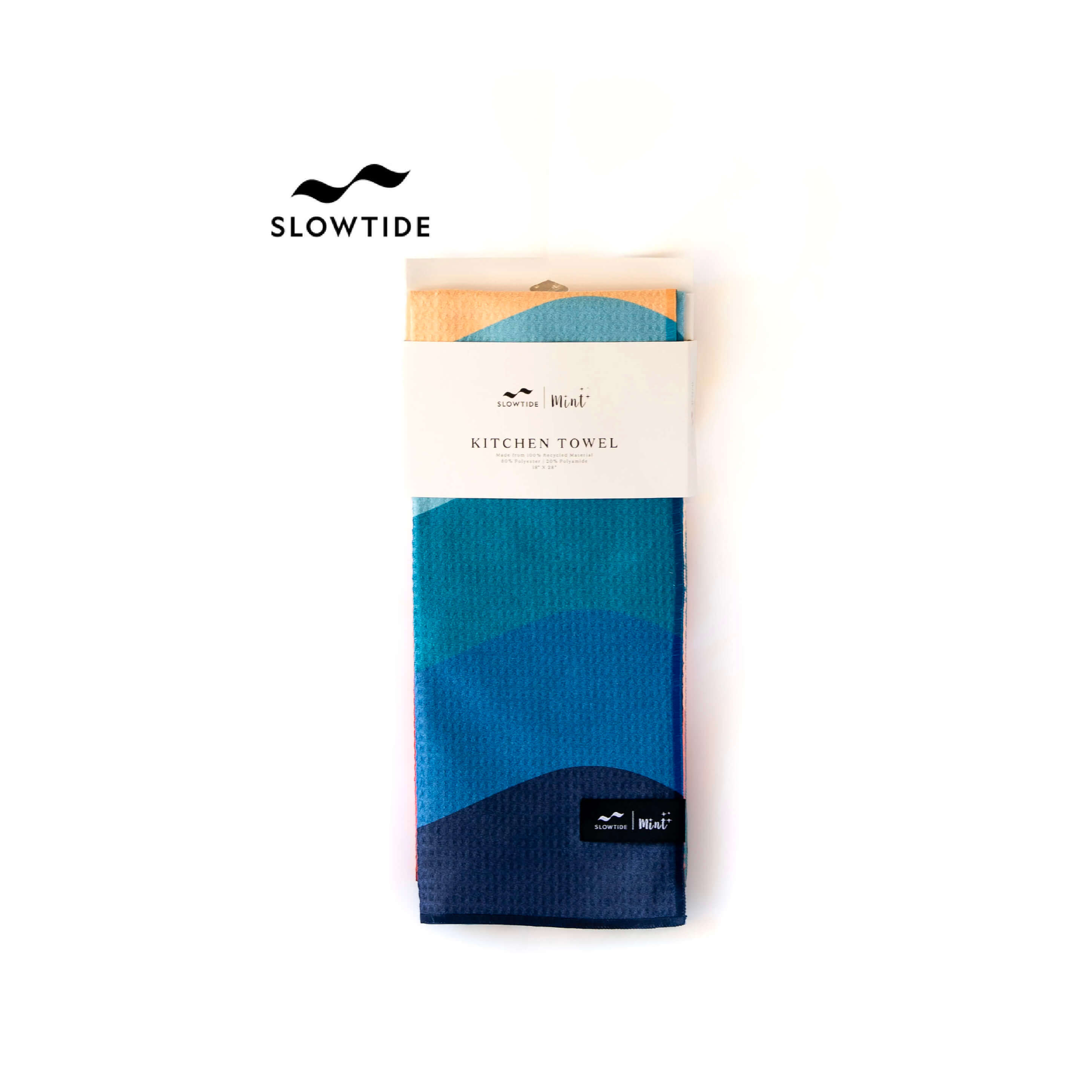 Packaged kitchen towel with Slowtide branding on a white background