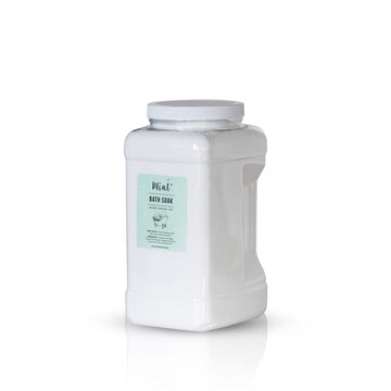 A large white plastic container with a handle, labeled "Mint+ Bath Soak." The label features a white background with minimalist design elements. The container is placed against a light mint background, reflecting a clean and calming aesthetic.