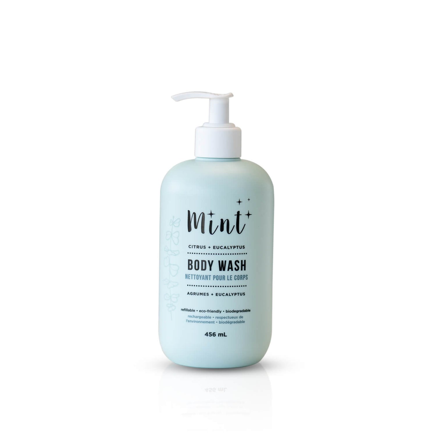 A light blue 456 mL bottle of &quot;Mint+ Body Wash&quot; with a pump dispenser. The label features the scents &quot;Citrus + Eucalyptus&quot; and includes bilingual text, &quot;Nettoyant pour le corps.&quot; It highlights the product&