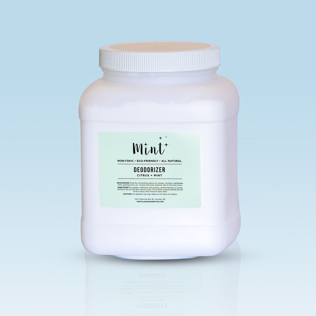 Mint brand citrus and mint-scented eco-friendly deodorizer refill in a large white container against a gradient blue background.