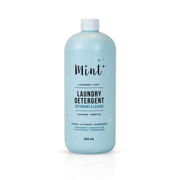 Mint Laundry Detergent in a 952ml bottle on a white background, highlighting its natural, refillable, and biodegradable formula.